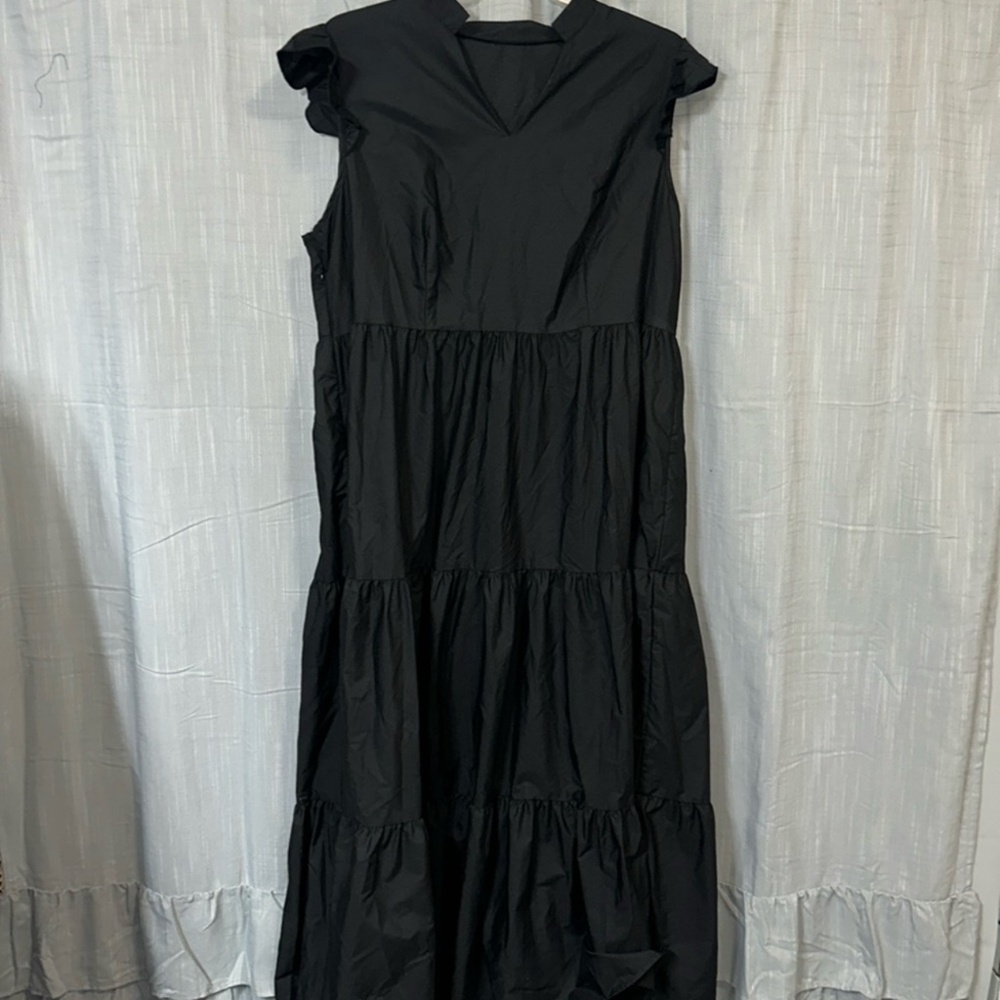 Ruffled shoulder black dress